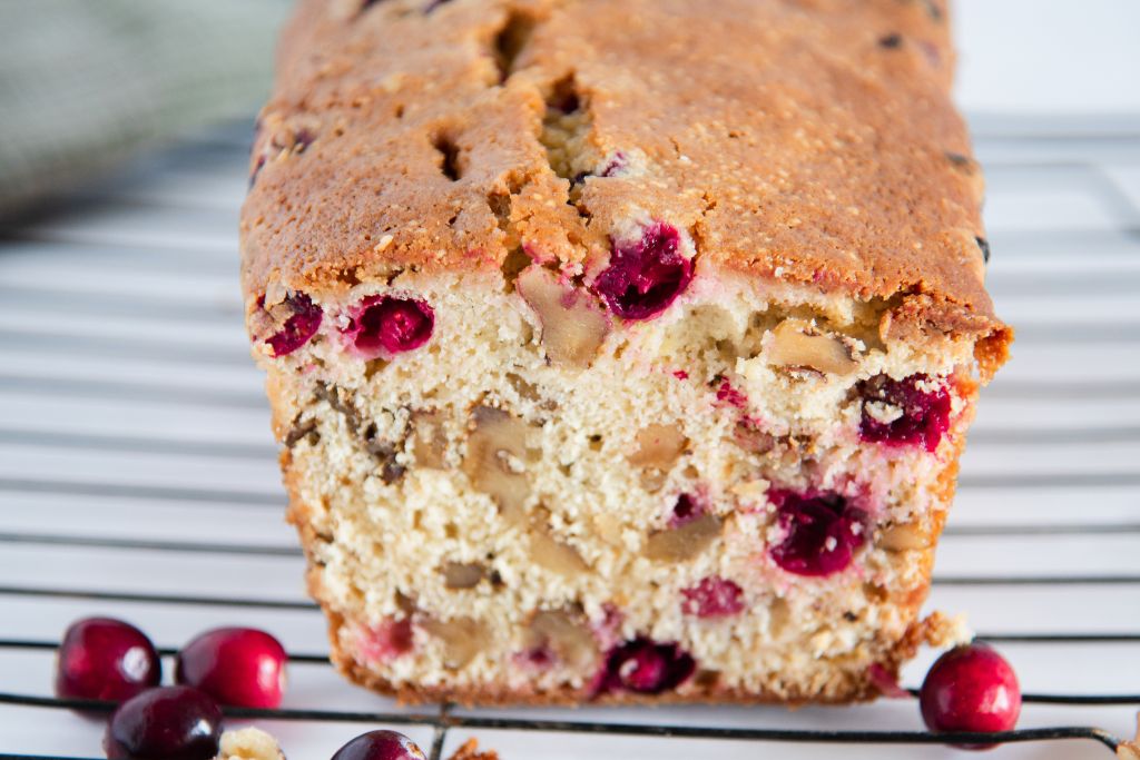 a close up of a loaf of cranberry that end has been cut off of