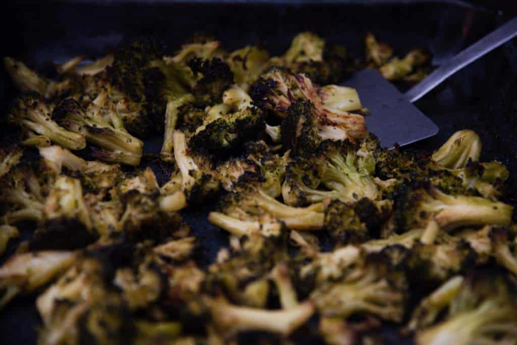 a spatula of roasted broccoli