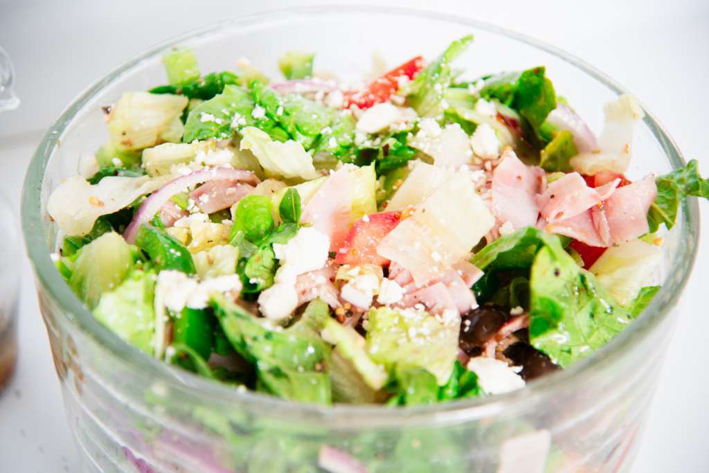 a close up of a bowl of salad