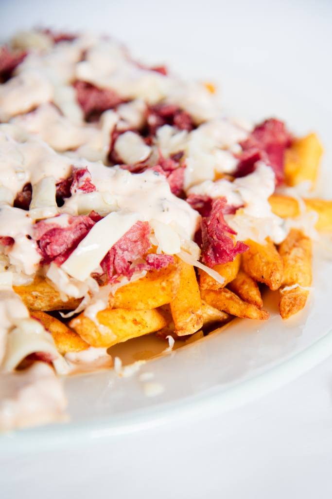 a cut off picture of loaded reuben fries