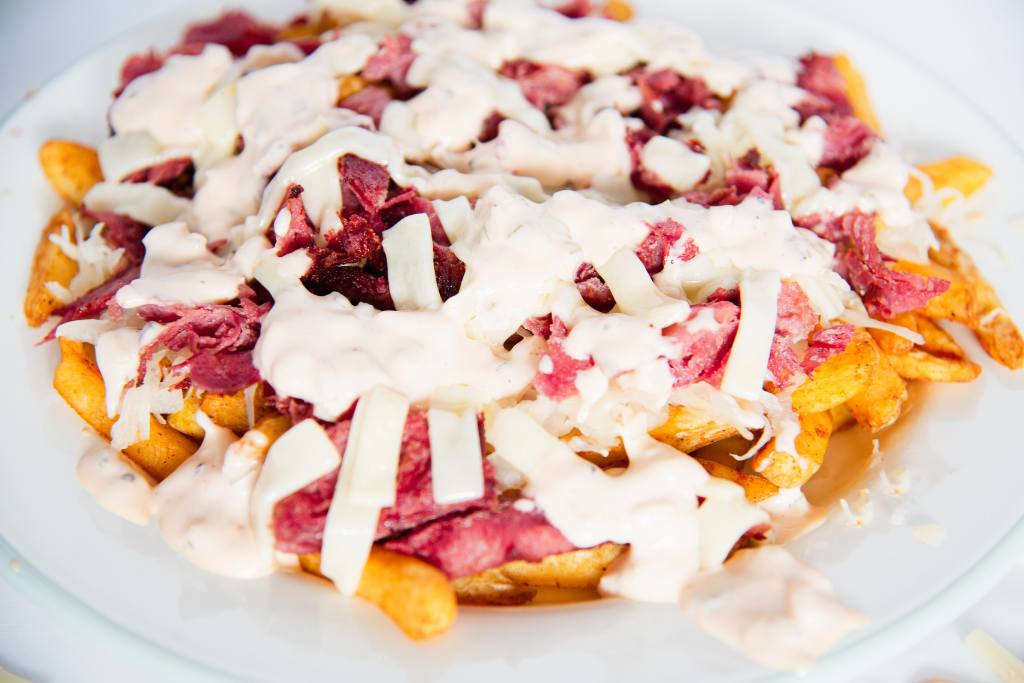 a finished plate of reuben fries 