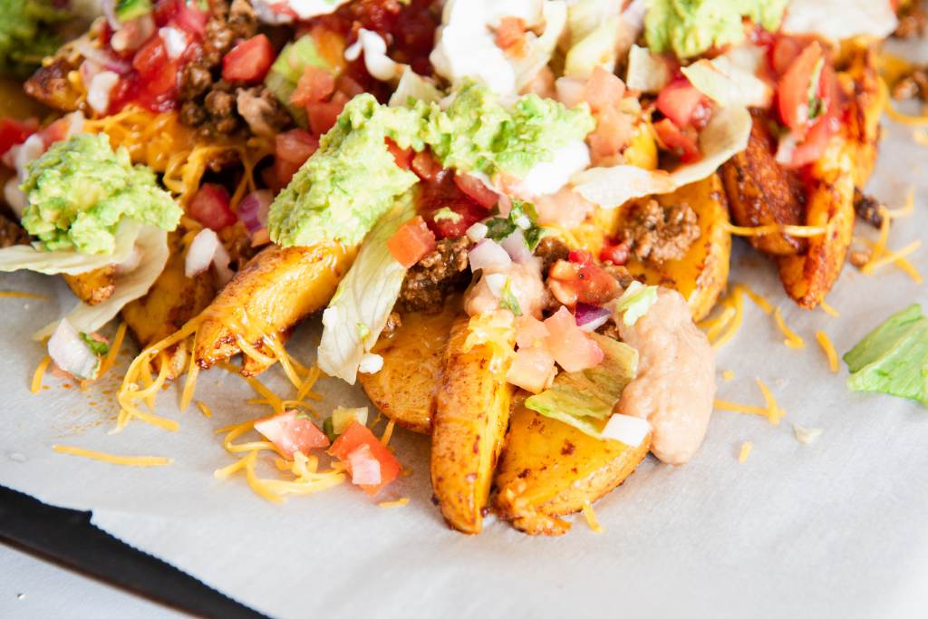 a close up of finished nacho fries