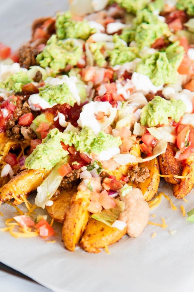 a pan of loaded nacho fries 