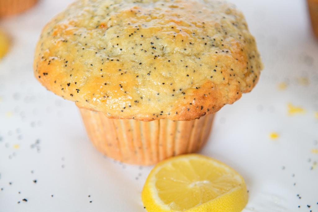 a very close up of a lemon poppy seed muffin