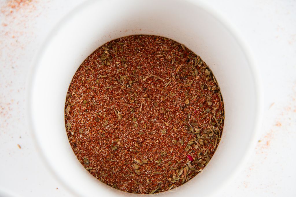 blackening seasoning in a small white bowl