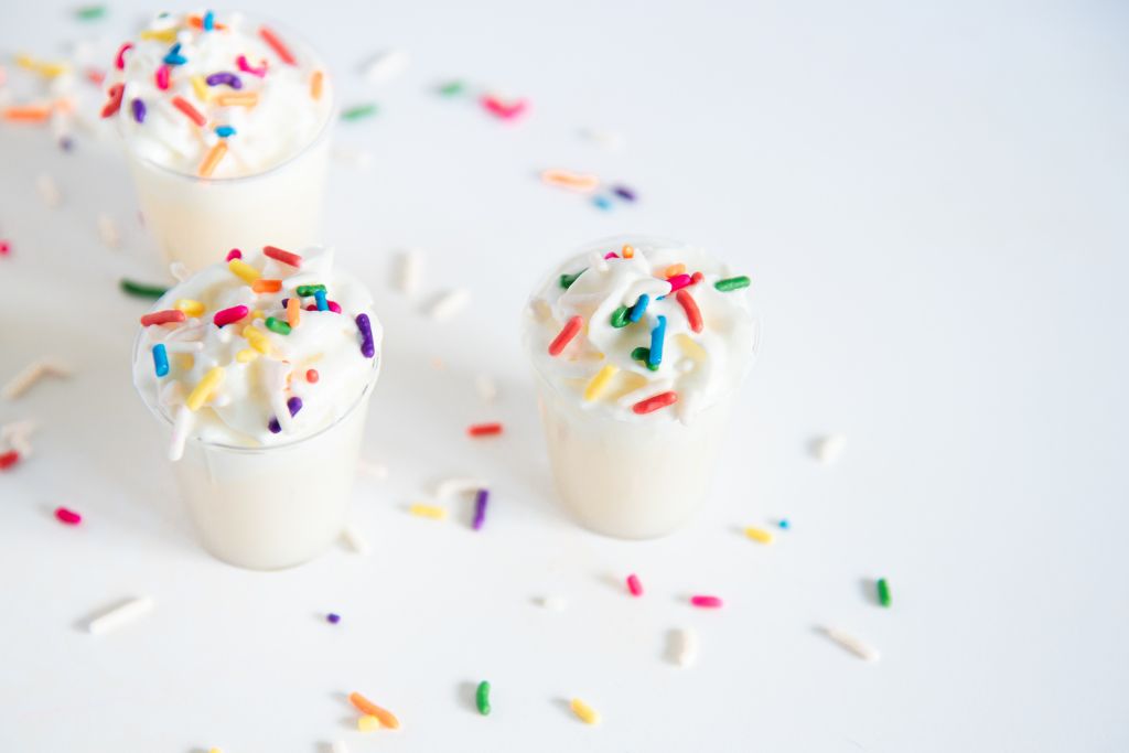 an overhead shot of three birthday cake shots