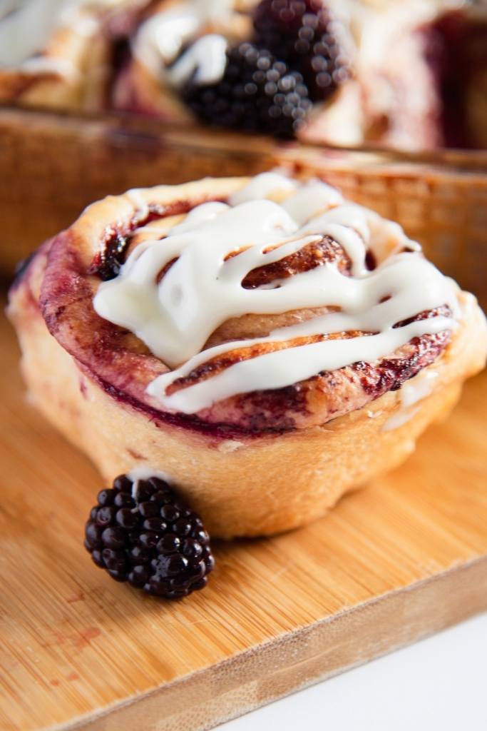 a close up of a blackberry sweet roll