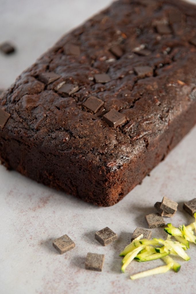 a uncut loaf of chocolate zucchini bread