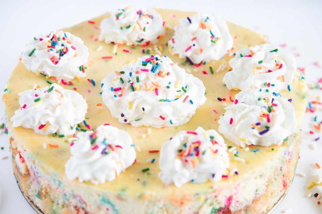 a finished birthday cake cheesecake