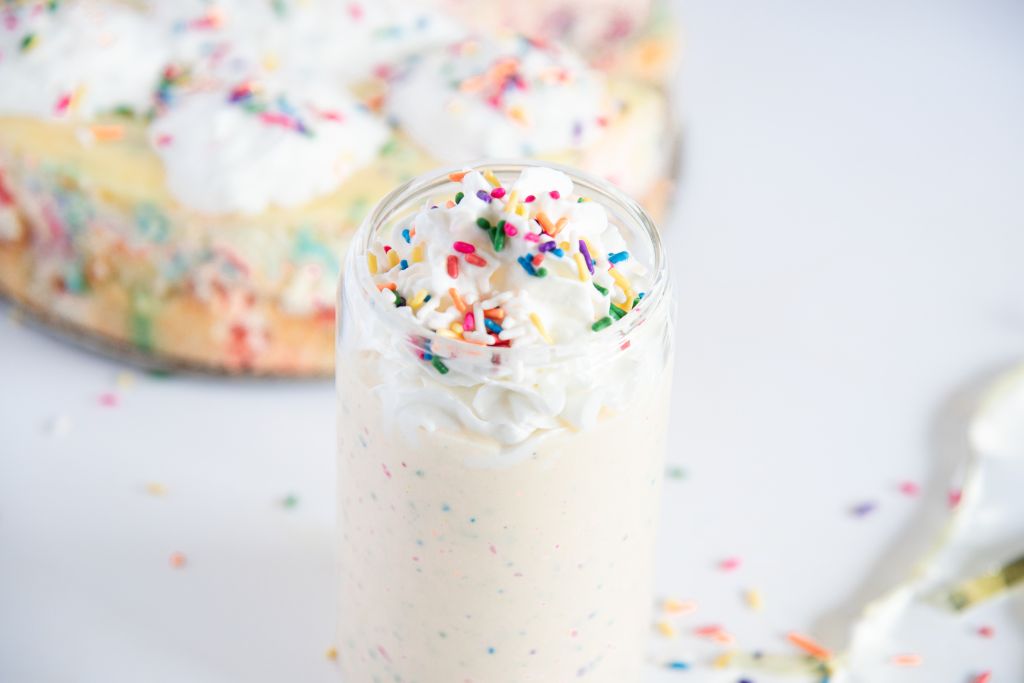 an overhead shot of a birthday came milkshake