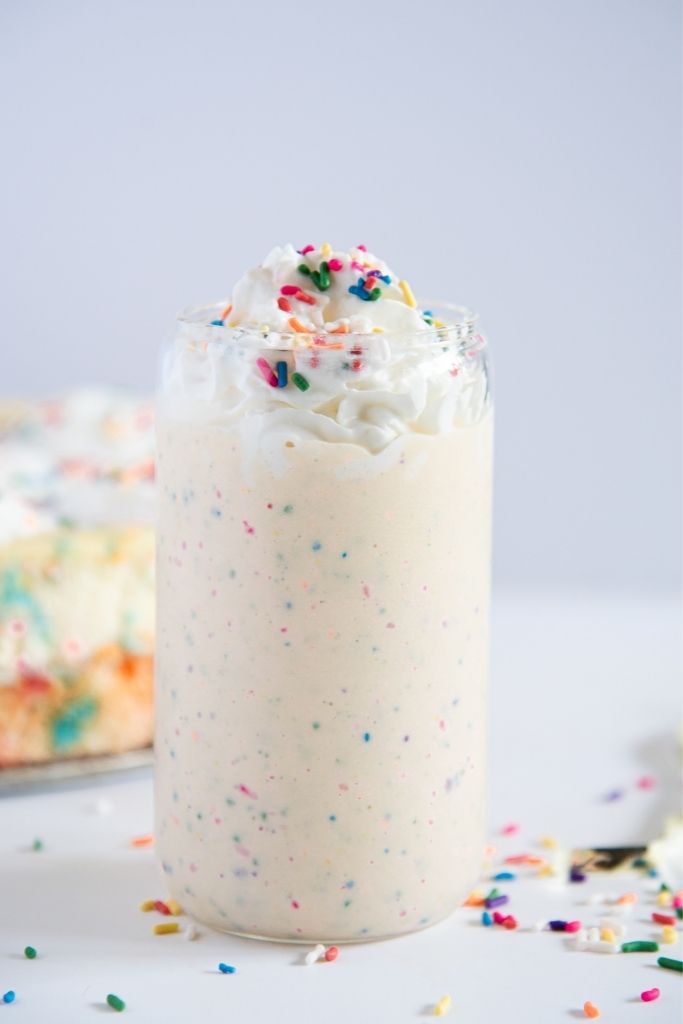 a side shot of a birthday cake milkshake