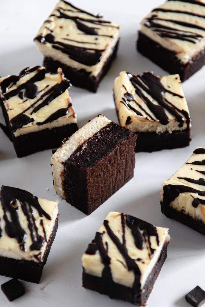 a close up on a cheesecake brownie turned on it's side 