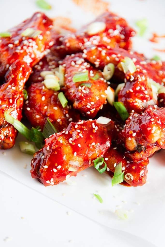 chicken wings piled on top of each other 