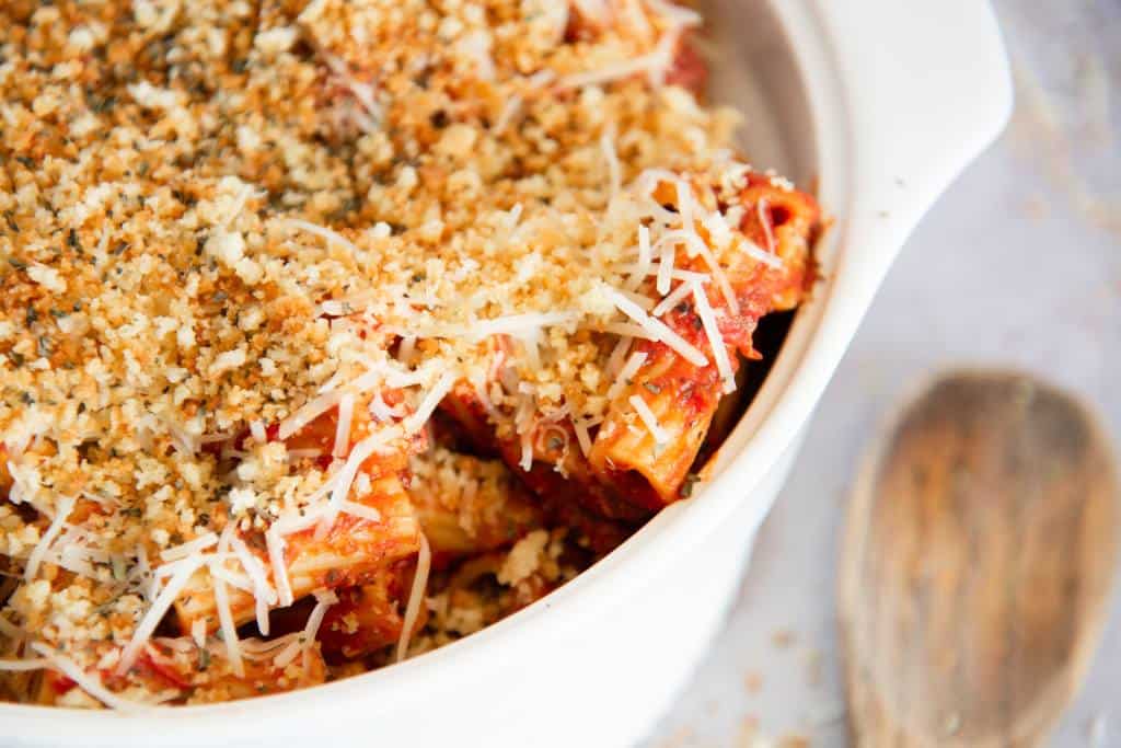 a close up on a dish of pizza pasta 