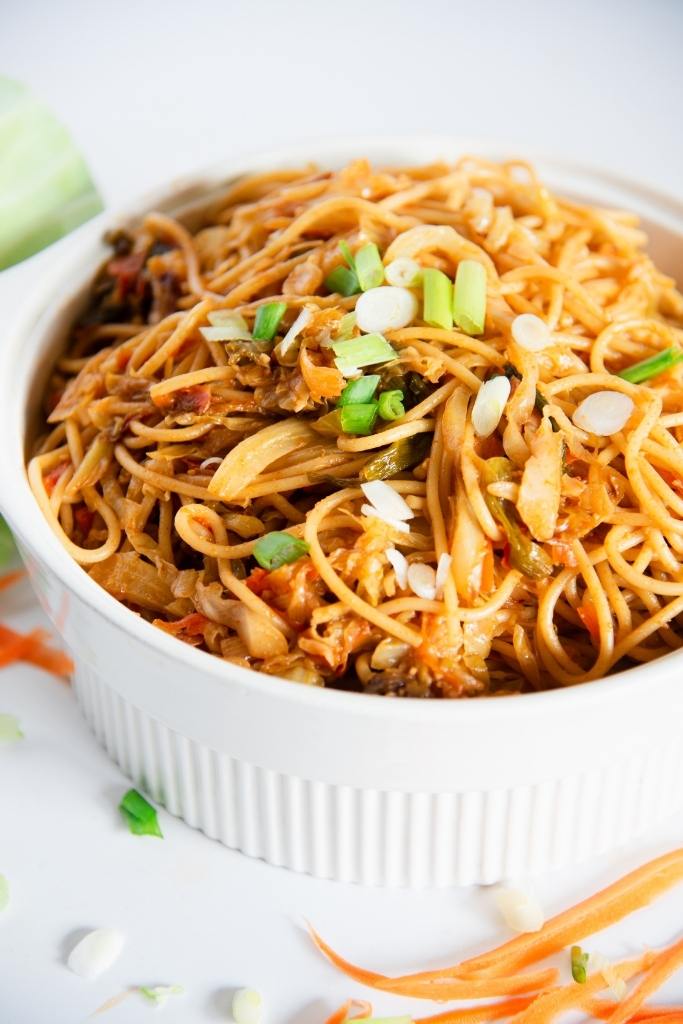 a close up of a dish of cabbage noodles