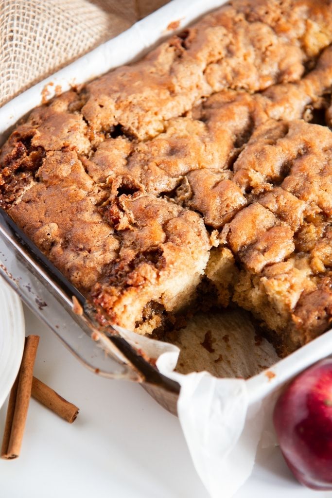 a close up of a pan of coffee take with piece taken out of it