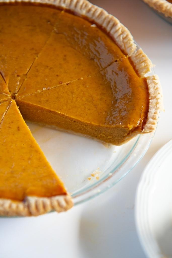 a close up of a pie that has a slice taken out of it