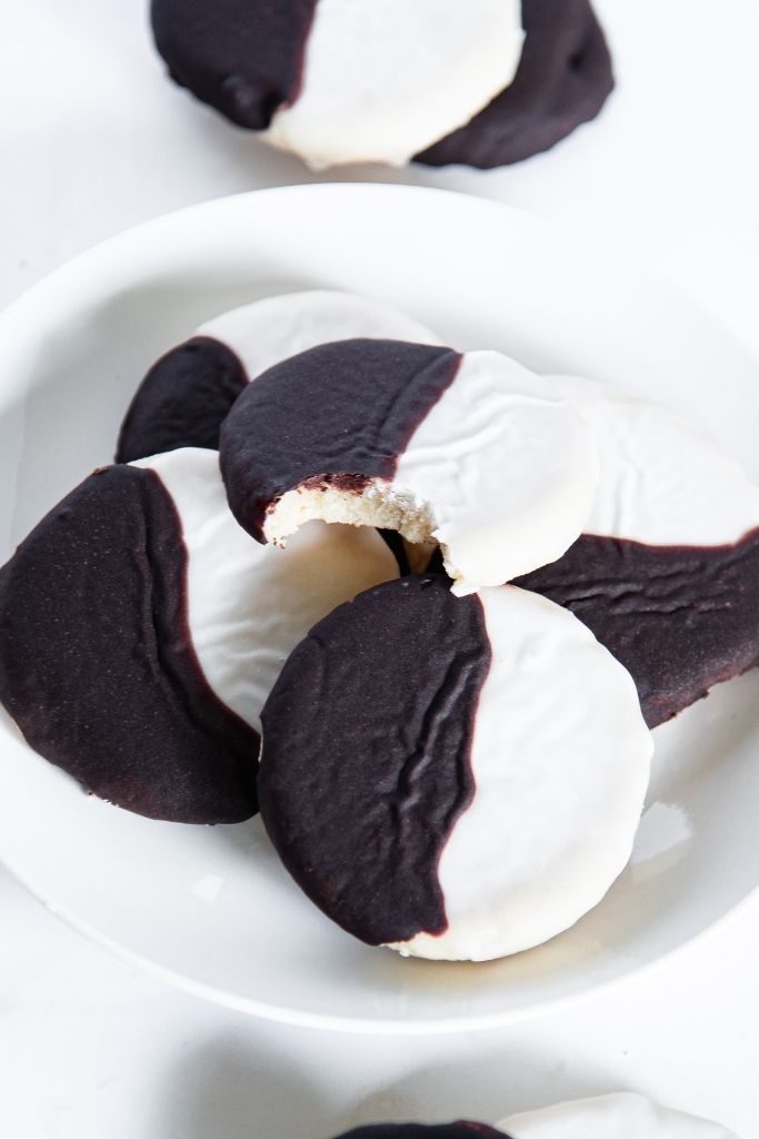 a close up of a cookie that has a bite taken out of it 