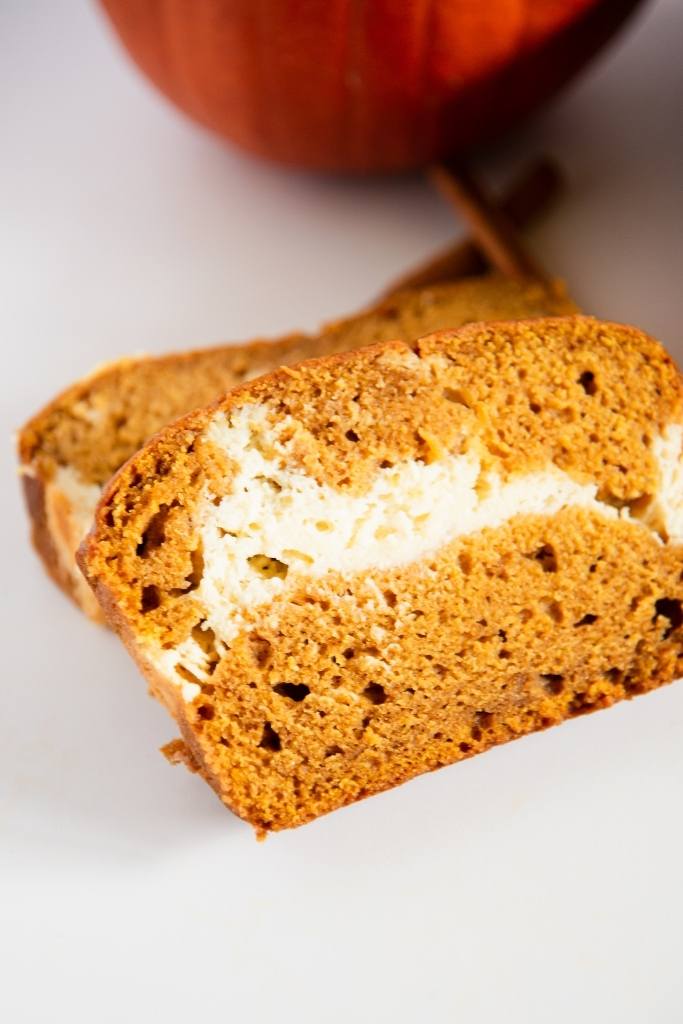 a close up of two slices of bread stacked on top of each other 