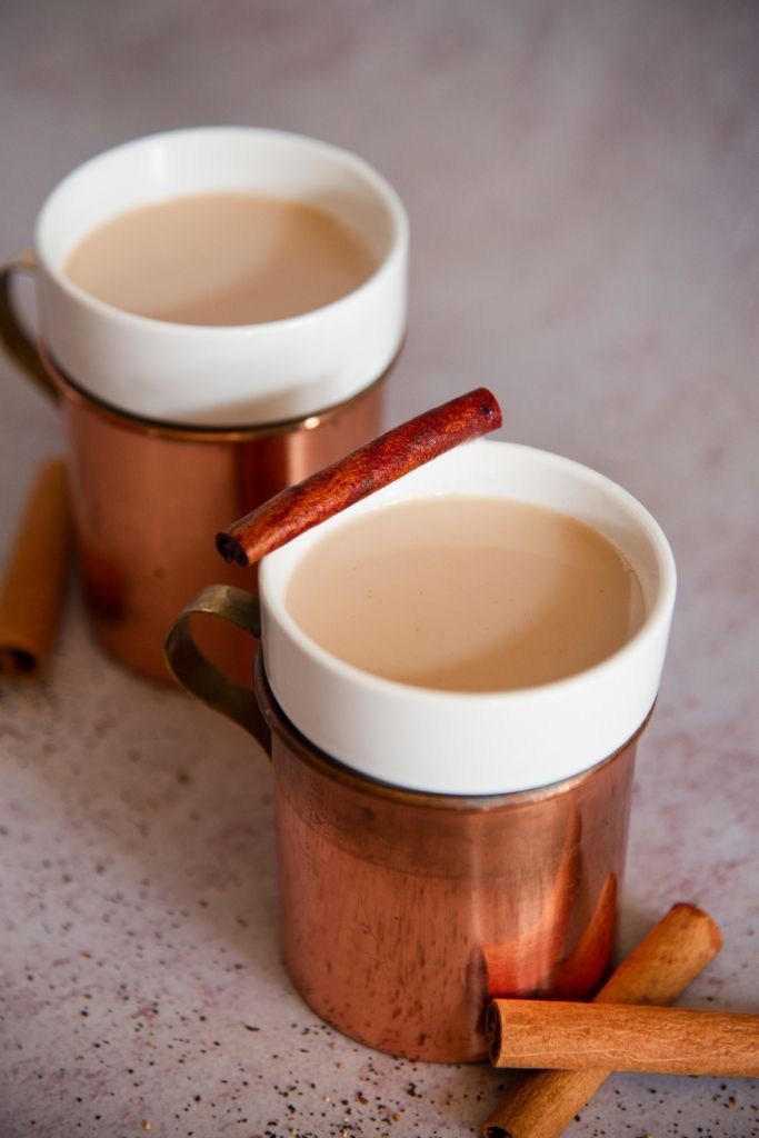 a close up of a two bourbon chai nightcaps