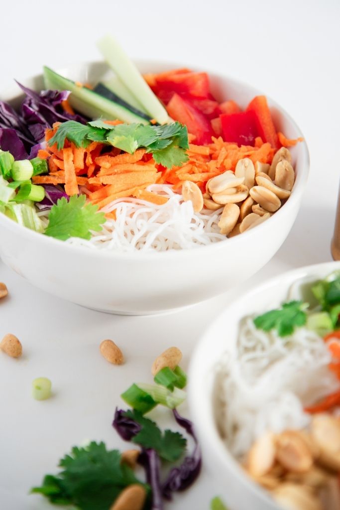 a close up of a spring roll salad