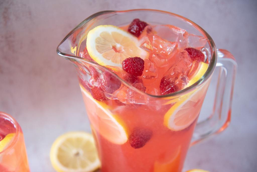 a close up of the top of a pitcher of lemonade 
