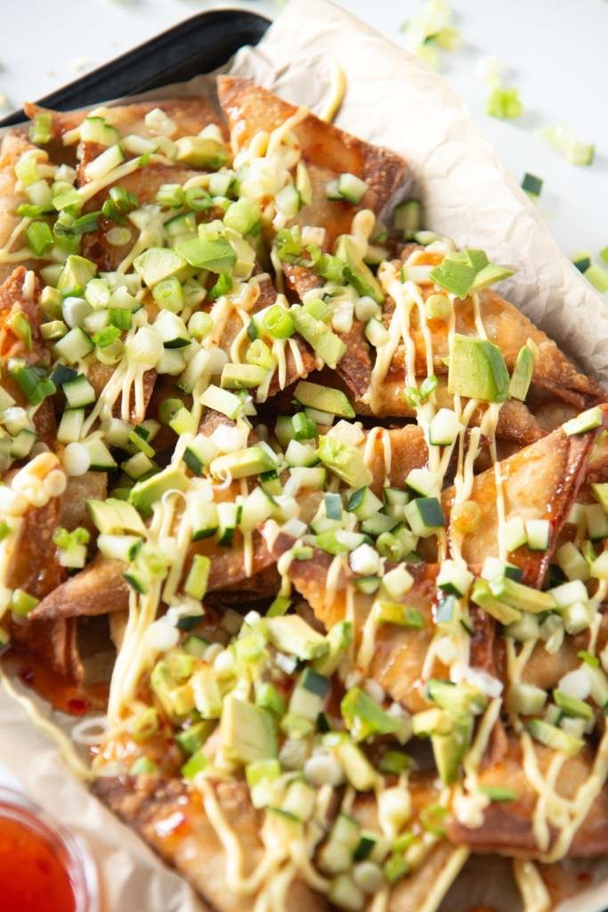 a tray of crab rangoon nachos 