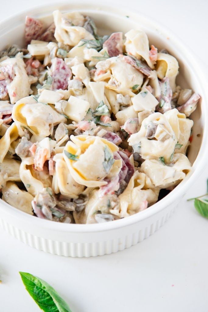 a close up of a bowl of tortellini pasta salad 