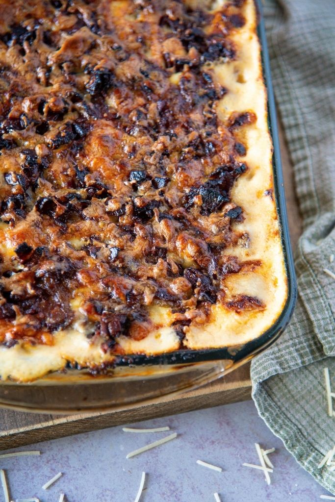 a close up of a pan of mac n cheese